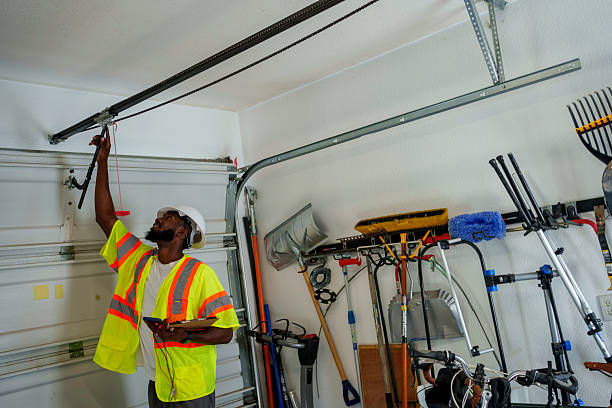 Professional Garage Door Panel Replacement technician working in Monroe County County, IL